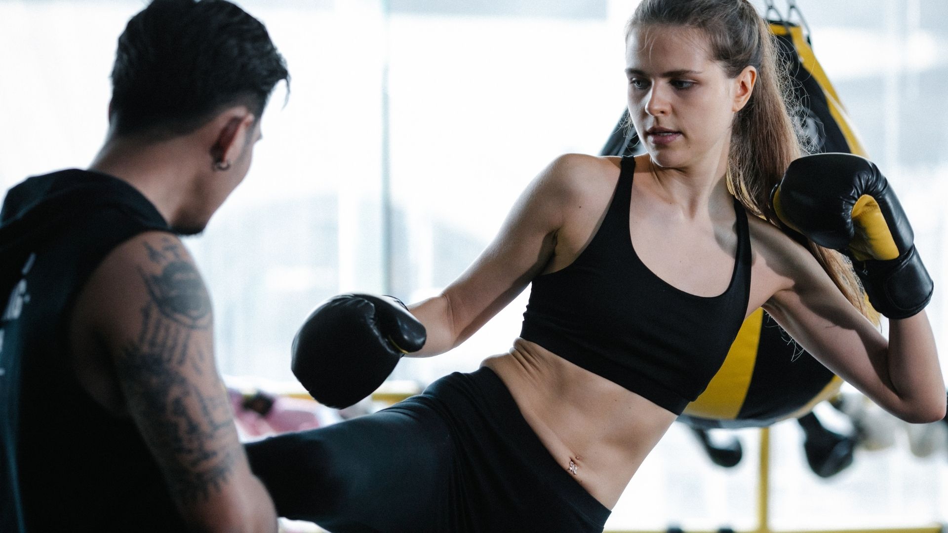 Kickboxing personal trainer coaching a client in Dubai